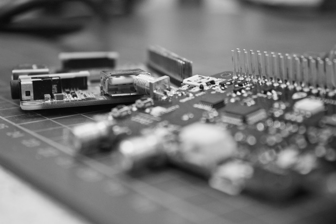 a close up of many electronic components on a table